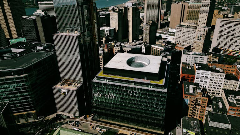 Stunning aerial view of Detroit's downtown skyline featuring iconic architecture.